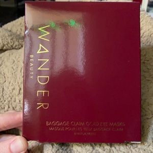Wander baggage claim gold eye masks